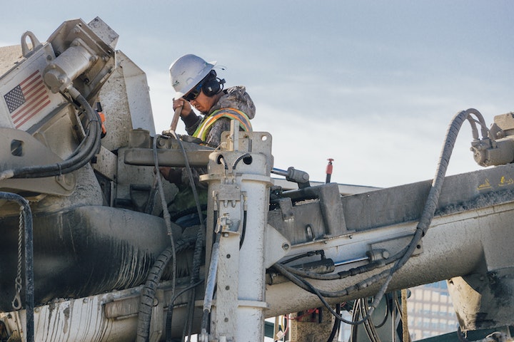 A man doing concrete chipping work
