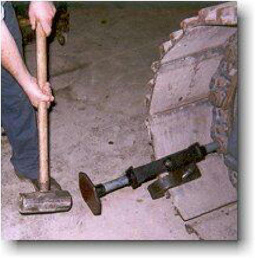 hammering track pin