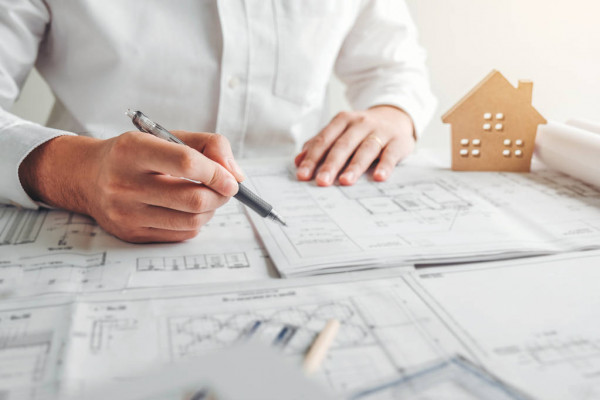 Engineer signing documents