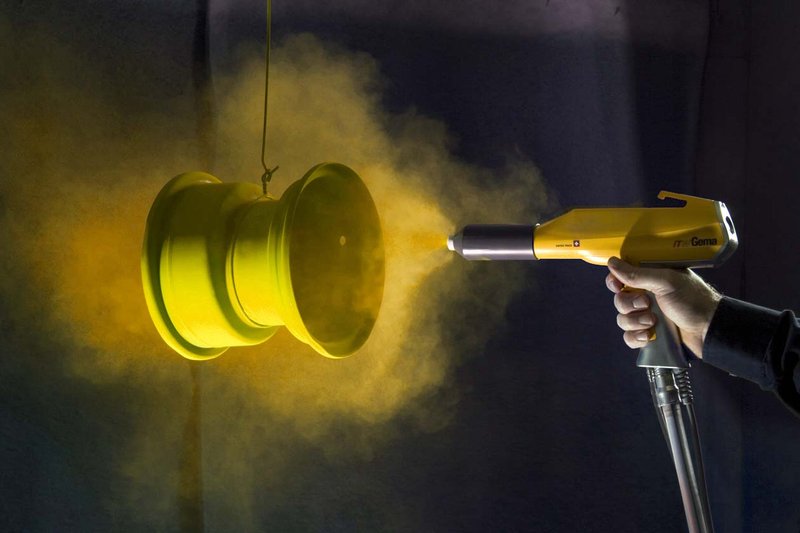 Powder coating application on a metal