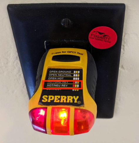 Outlet tester for checking the polarity of outlets